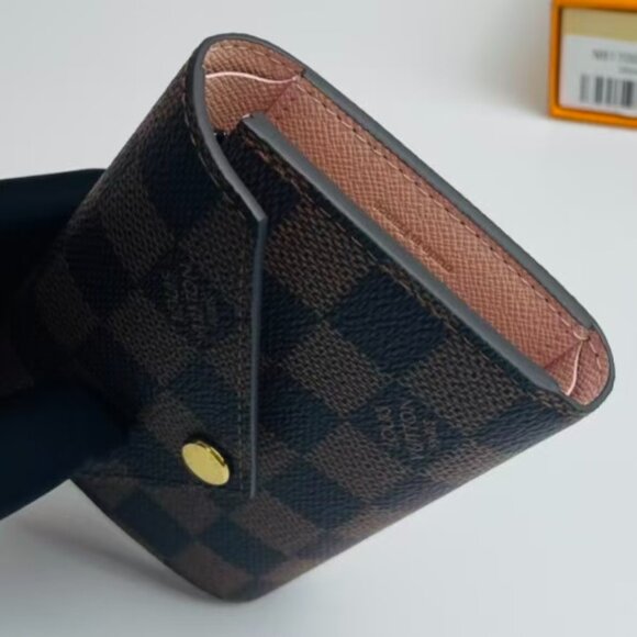 Louis Vuitton brown monogram wallet. - Picture 1 of 8